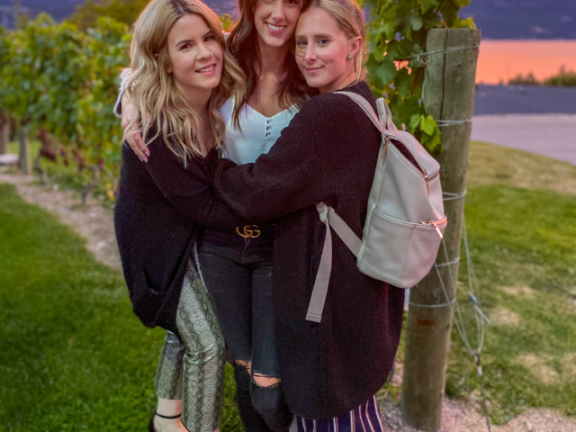 Friends along a sunset winery tour in Lake Country, British Columbia