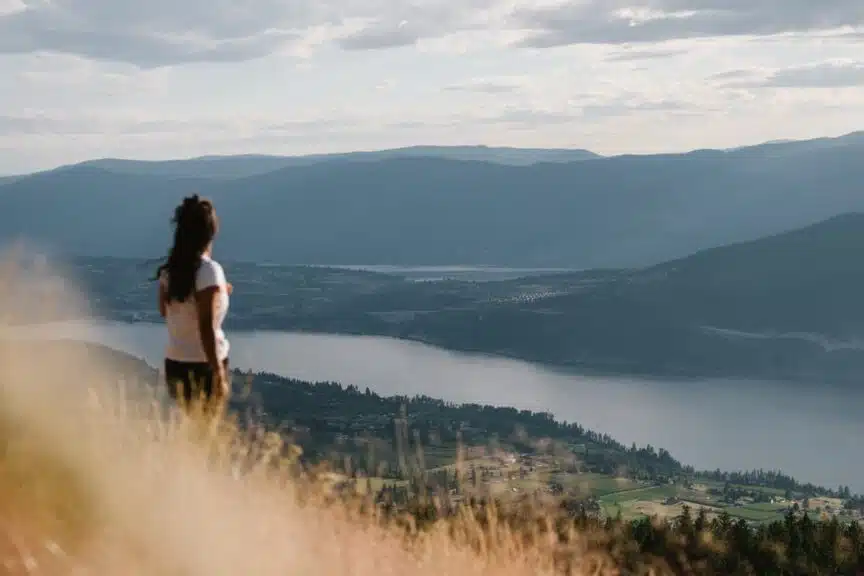 Looking over a lake near Oyama, B.C. on a guided hiking tour in the Okanagan Valley